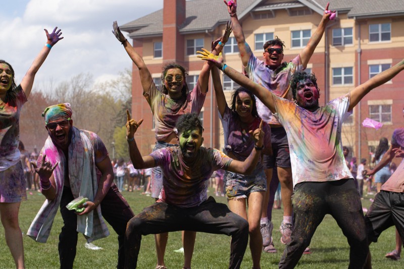 Students celebrate Holi.