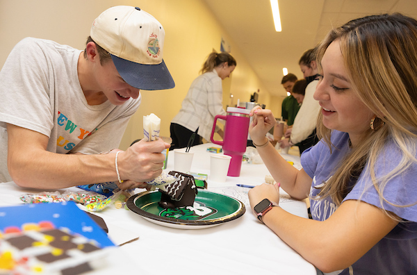 students making a gingerbread house