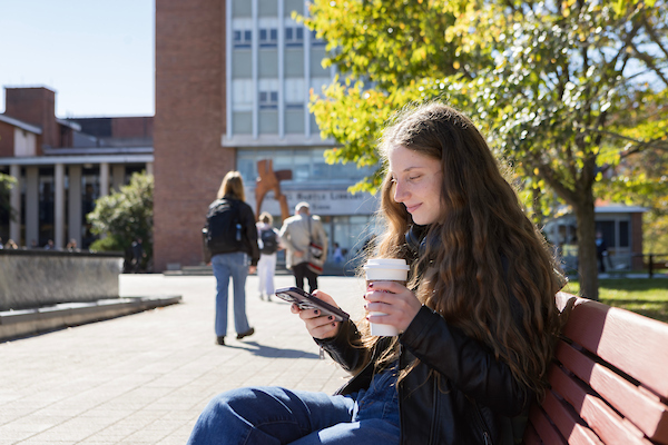 student with coffee