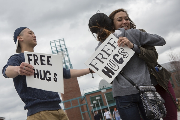 People participating in random acts of kindness