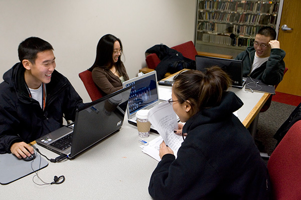 Students studying together on campus