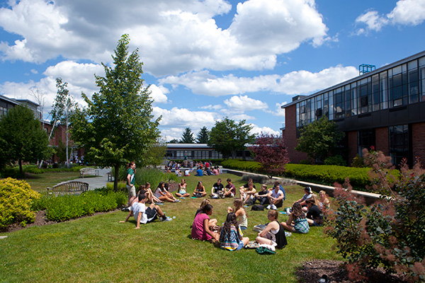 Students in the memorial courtyard