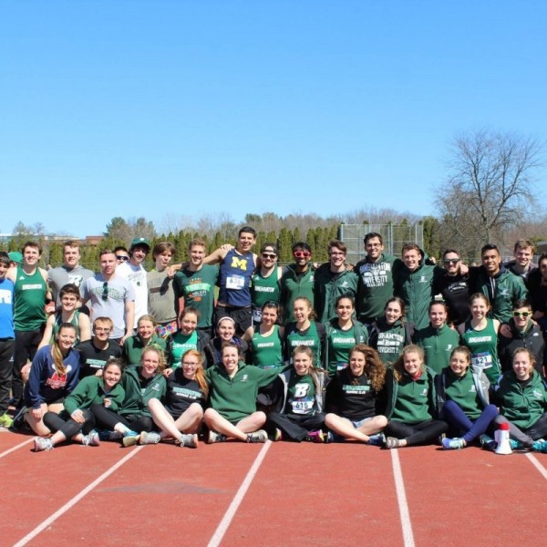 Members of the running club pose for a photo