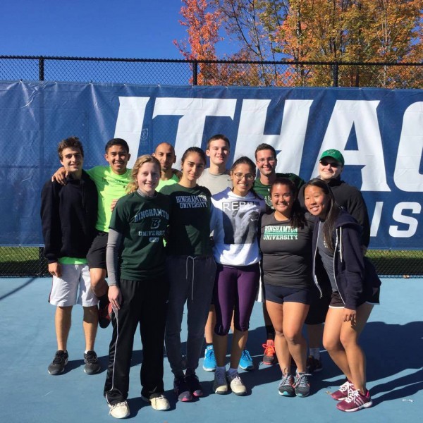 Members of tennis club pose for a photo