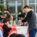 Binghamton students teach children at the STEM fair