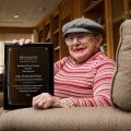 Zoja Pavlovskis-Petit receives a plaque for 60 years of service at Binghamton University