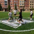 Students playing Spikeball on the Dickinson turf field