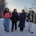 A group of students walk along the Lois B. DeFleur Walkway during a very cold start to the Spring 2025 semester, January 21, 2025.