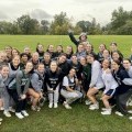 Members of the women's lacrosse team pose for a photo