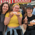 Students at Spring Fling with fried dough.