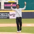 Student Busaro Robinson gets ready to pitch in the baseball field at Mirabito Stadium.