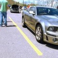 Students at a car show on campus