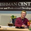 student worker at fleishman center desk