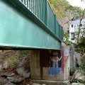 Troll painted under a bridge on campus