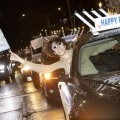 Person smiling during Chabad's annual Menorah Parade