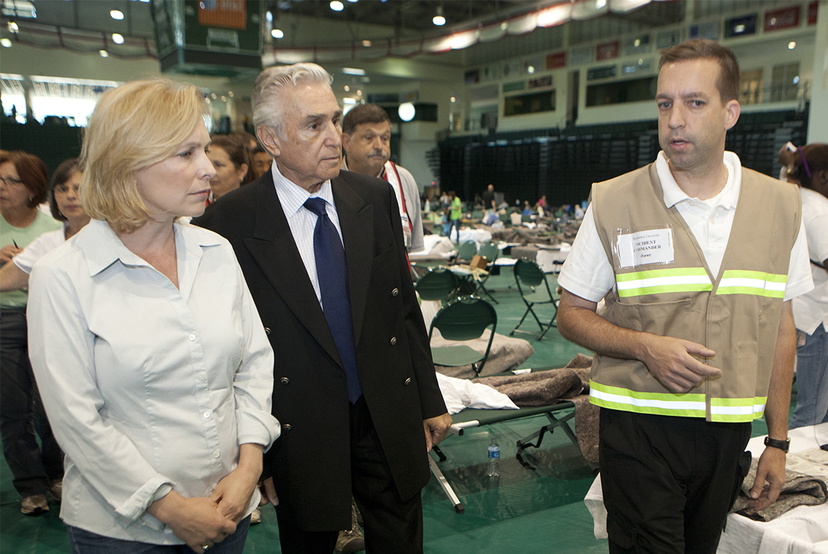 Dave Hubeny, right, leads U.S. Sen. Kirsten Gillibrand and then-U.S. Representative Maurice Hinchey through the Events Center following the 2011 flood, when the facility was serving as the largest Red Cross shelter in the Northeast.