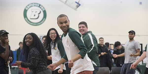 Students participate in a Zumba class during Binghamton University's annual Health Fair.