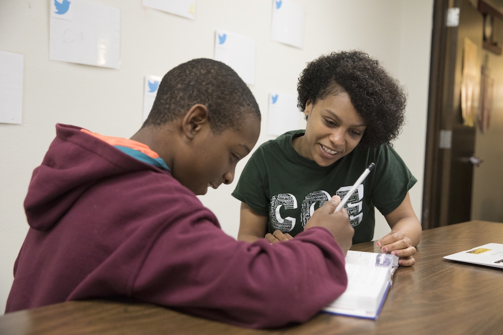 Binghamton University students tutor Johnson City High School students at the school's Promise Zone on May 1, 2017.