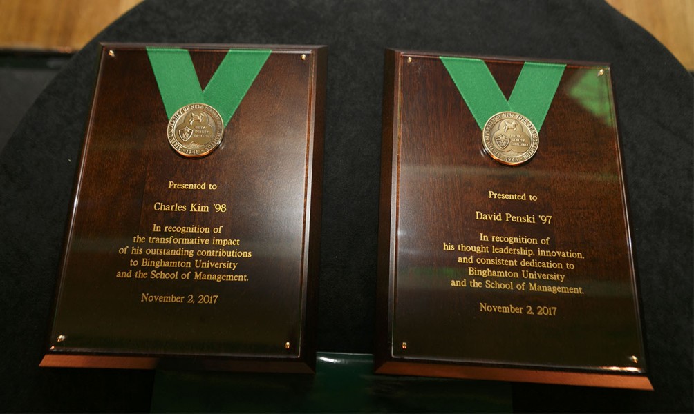 Charles Kim '98 and David Penski '97 were each awarded a University Medal during the second School of Management Fundraising Gala, held Nov. 2, at the Grand Hyatt in New York City.