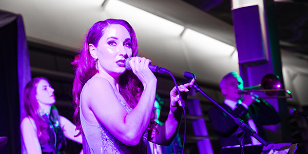 The June 1 Binghamton University Forum Black-Tie Gala featured vocalist Robyn Adele Anderson '11, a cast member and featured artist for Postmodern Jukebox, whose videos have over 200 million YouTube views. The gala was held at the Appalachian Collegiate Center on campus.