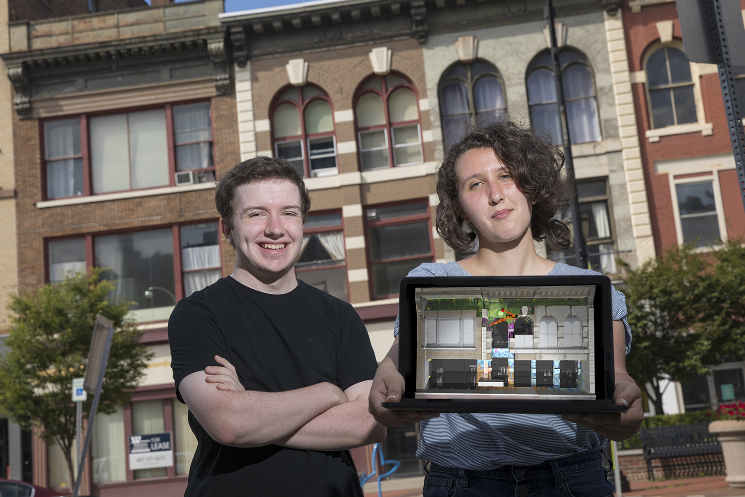 Paul Tilley and Madison Werner, computer science majors at Binghamton University's Thomas J. Watson School of Engineering and Applied Science, have created retro videogames that will be projected on 75-79 Court St. in downtown Binghamton during the LUMA Projection Arts Festival.