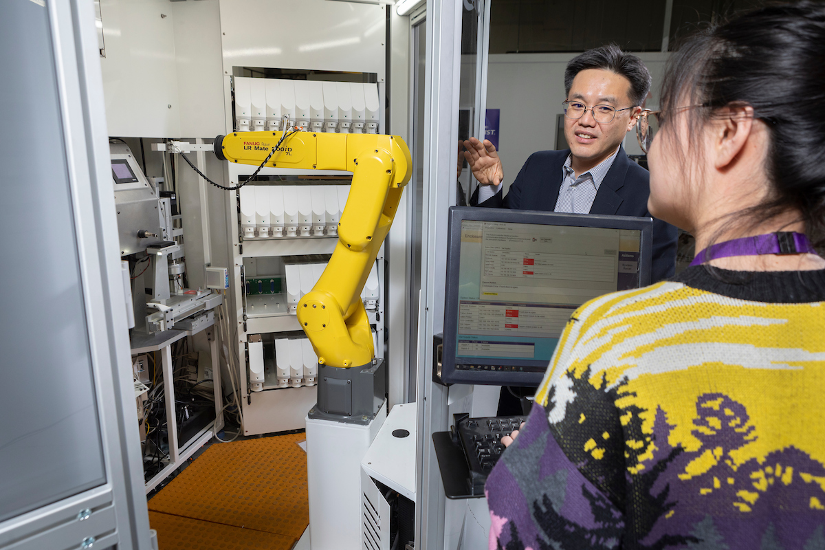 Professor Sangwon Yoon from the Systems Science and Industrial Engineering Department works at Innovation Associations in Johnson City in 2020 using the PharmASSIST system with graduate student Qianqian Zhang.