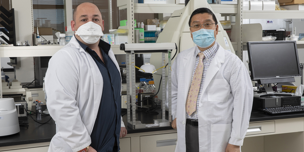 Associate Professor Guy German, left, and Distinguished Professor Kaiming Ye, chair of the Department of Biomedical Engineering, have new research that offers provable standards for ultraviolet disinfection.