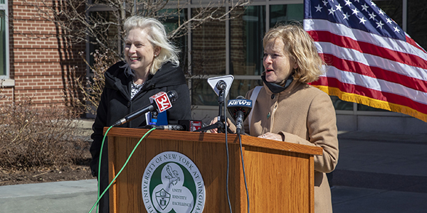 U.S. Sen. Kirsten Gillibrand, left, and College of Community and Public Affairs Dean Laura Bronstein at a press conference to support Community Schools.