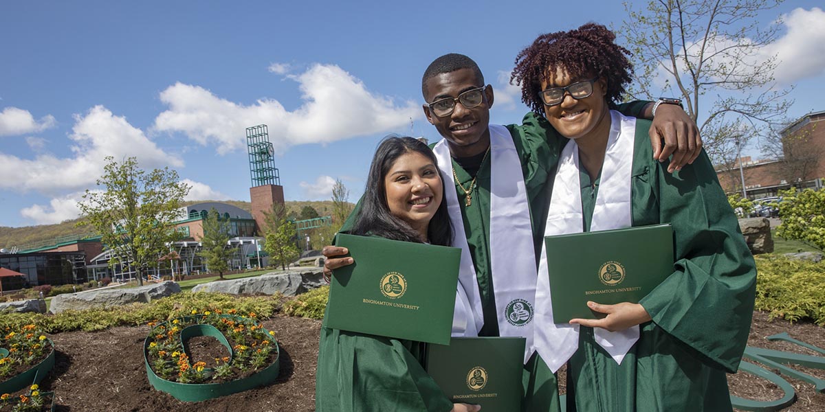 Class of 2021 members took photos at the berm to celebrate graduation.