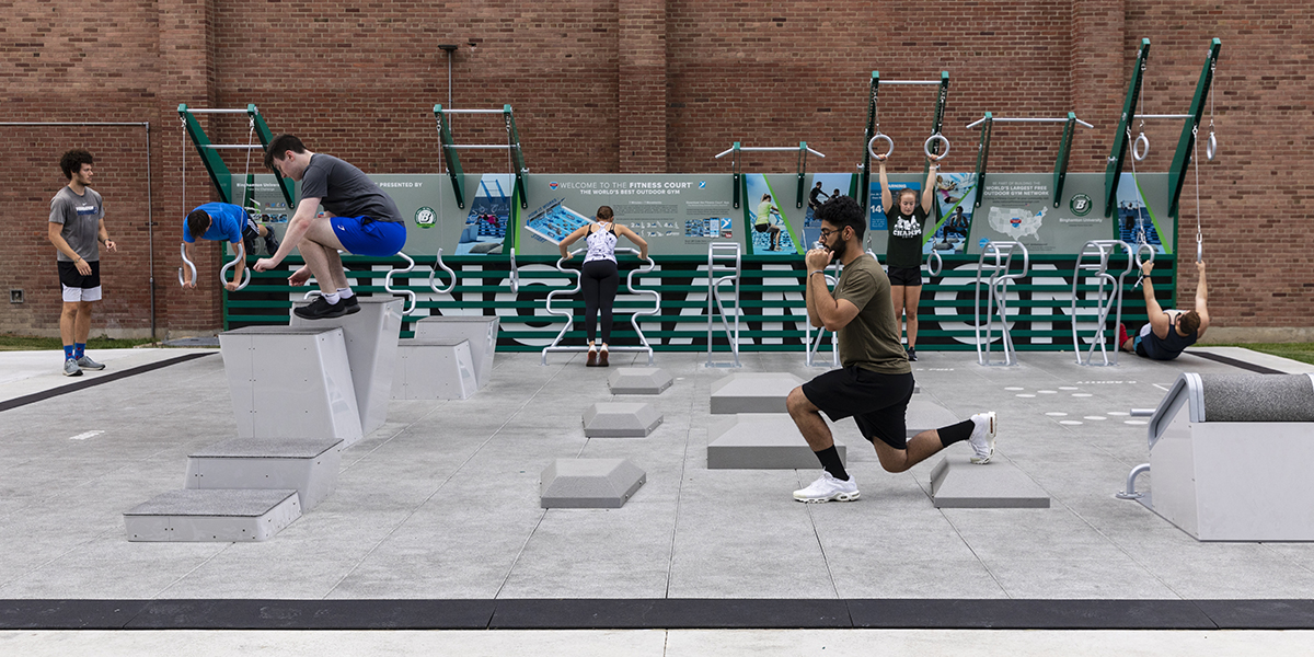 Students use the new outdoor FitCourt adjacent to the Rec Center at the East Gym.