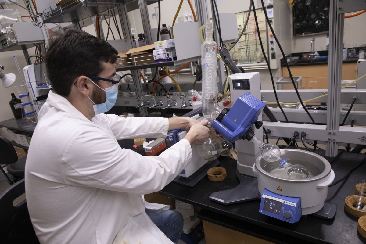 Christopher Ryan, a doctoral student in chemistry, works in a laboratory at the Smart Energy Building, Thursday, September 23, 2021.