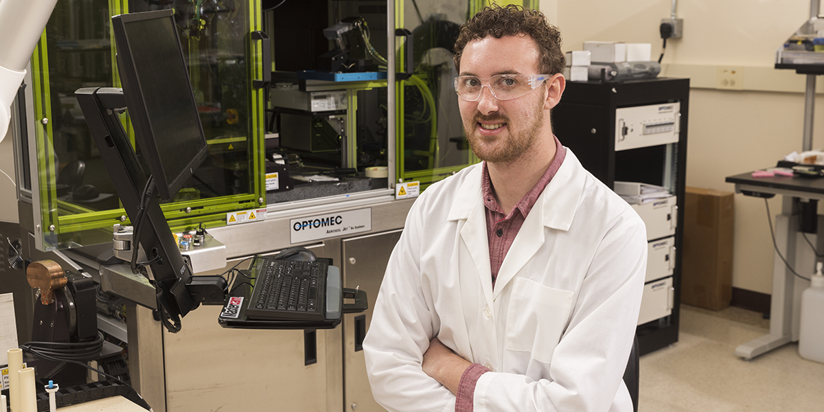 Dylan Richmond, a PhD student in materials science and engineering, works in the Smart Electronics Manufacturing Lab at the Center of Excellence at the Innovative Technology Complex.