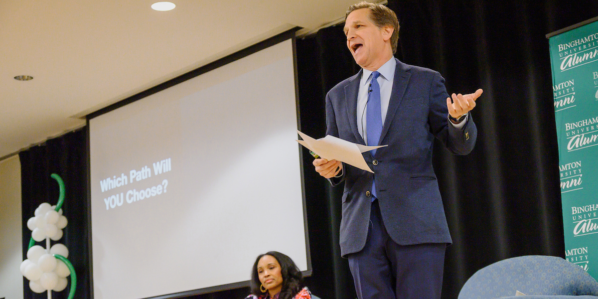 Nicole Yearwood ’97, MPA ’98, and Perry Ochacher ’84 speak at the Homecoming TIER Talks event.