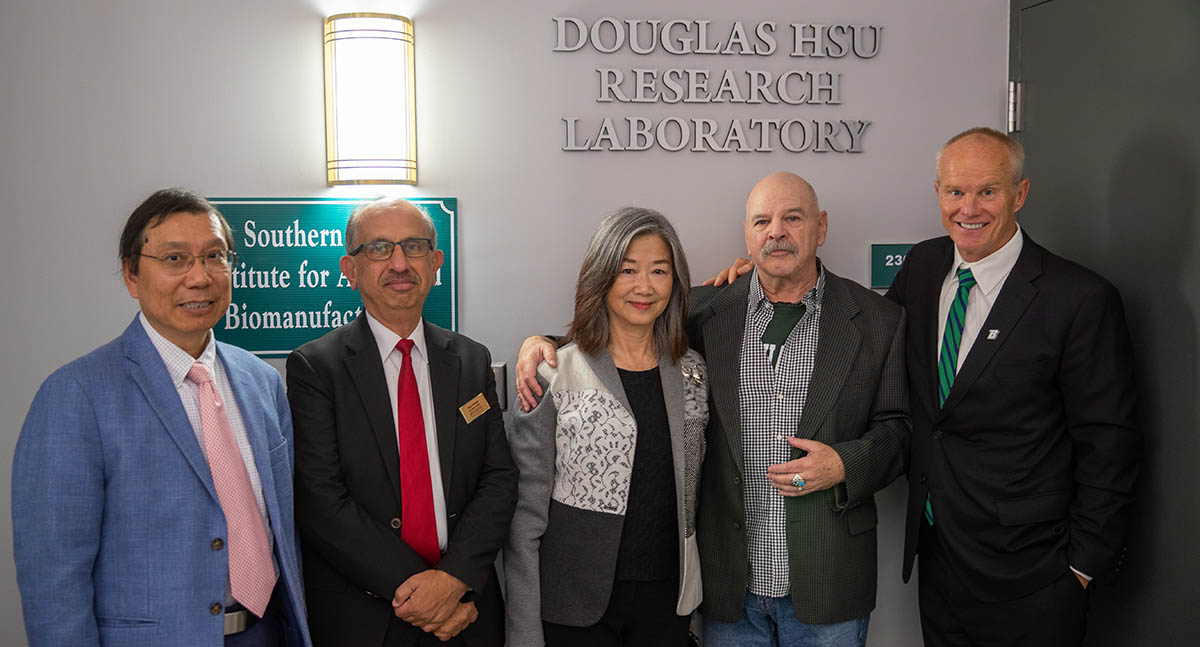 The Douglas Hsu Research Laboratory was dedicated in the Biotechnology Building at Binghamton University's Innovative Technologies Complex. From left are Distinguished Professor Kaiming Ye, chair of Watson’s Department of Biomedical Engineering and head of the Hsu lab; Watson College Dean Krishnaswami “Hari” Srihari; donors Connie Wong and Gary Kunis '73, LHD '02; and Binghamton University President Harvey Stenger.