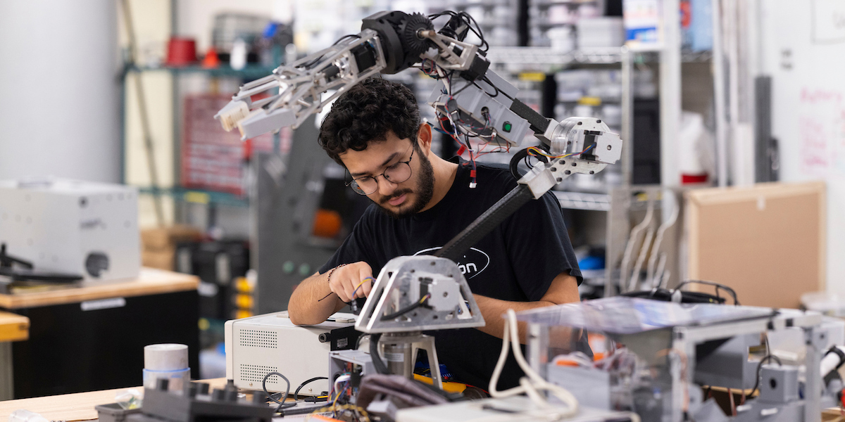 Junior mechanical engineering major and Binghamton University Rover Team member Matthew Stancampiano works this fall at the Fabrication Lab in the Engineering Building.