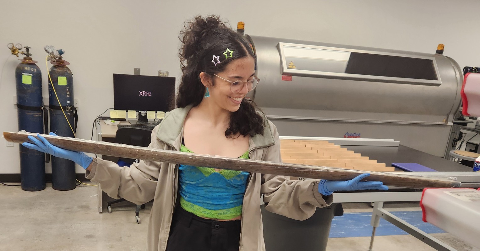 Sofia Corsico-Sánchez holds a sediment core during her summer research experience at the OCEAN CORE Academy in College Station, Texas.