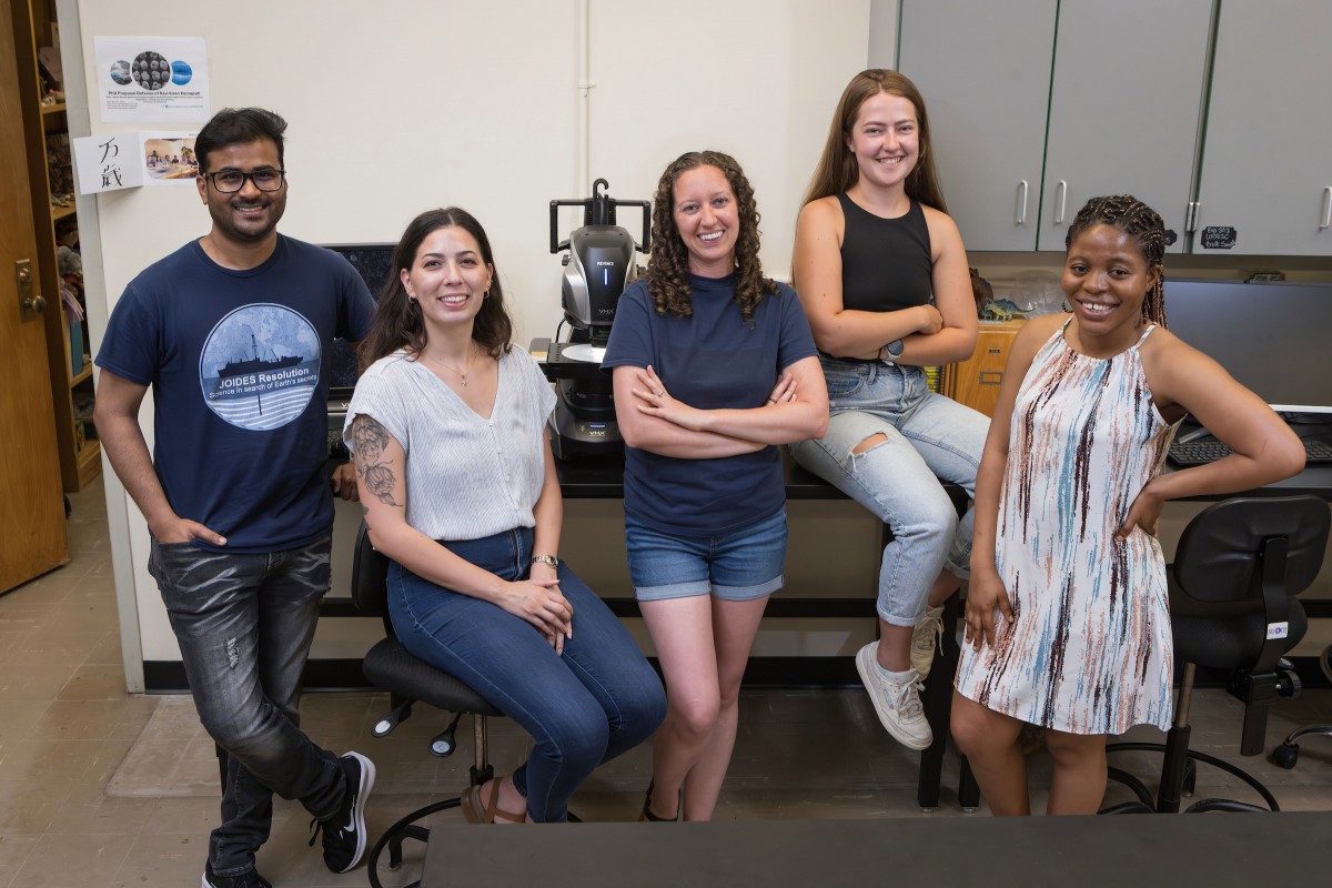 Assistant Professor of Earth Sciences Adriane Lam, center, and doctoral students Ravi Kiran Koorapati, Jeanette deCuba, Gretl King and Helena Kwarteng, all of whom received GSA grants for their dissertation research.