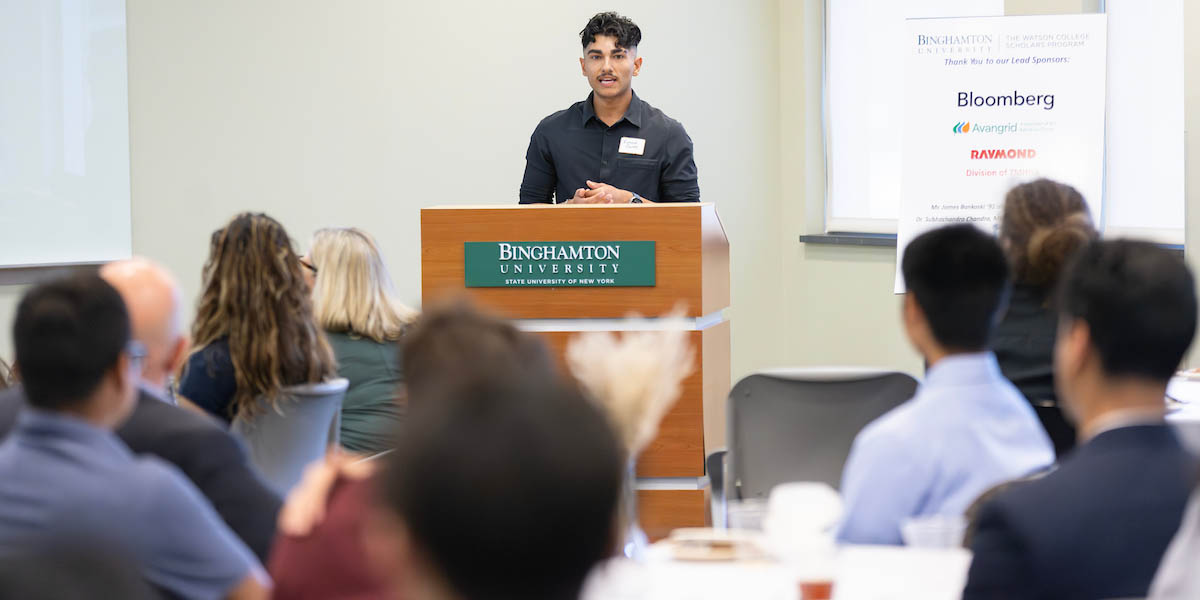 Richard Quiles ’24, MS ’25, assistant director of Watson College’s Office for Excellence in Diversity, Equity and Inclusion, speaks at a welcome event for the Watson College Scholars Program in October.