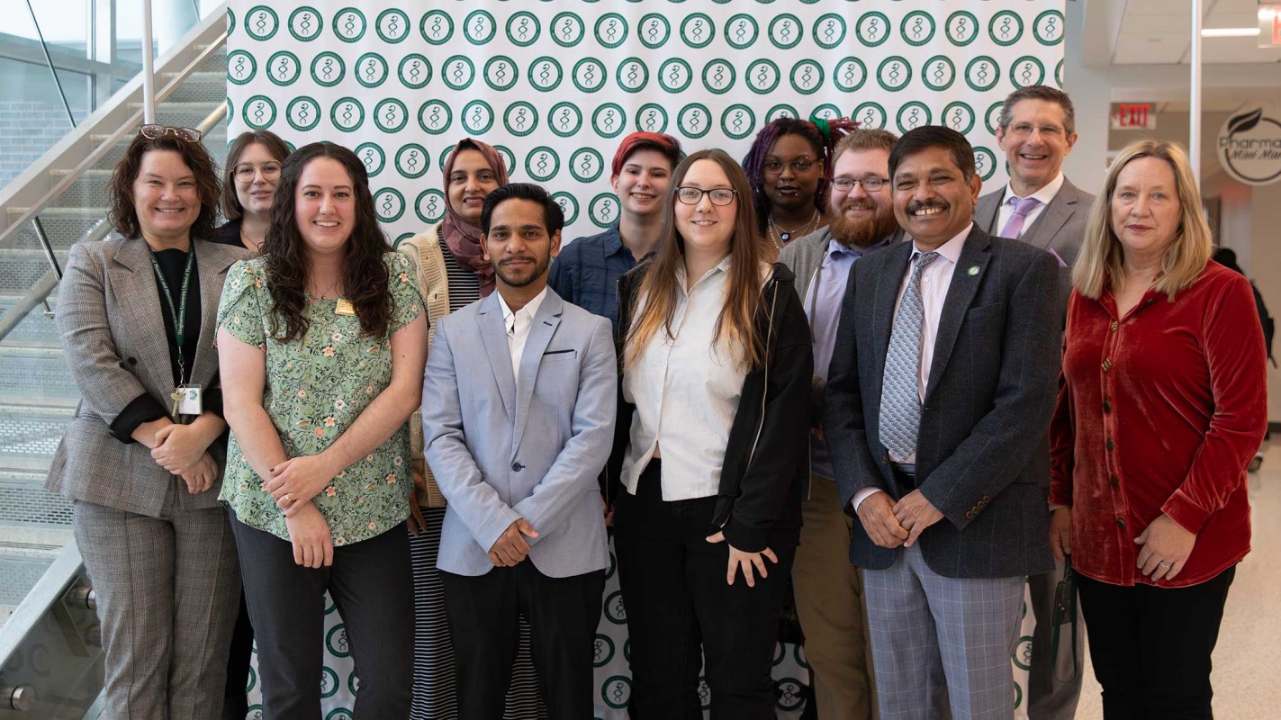 Group photo of faculty, staff and learners following the Pharmacy Technician Training Program graduation.