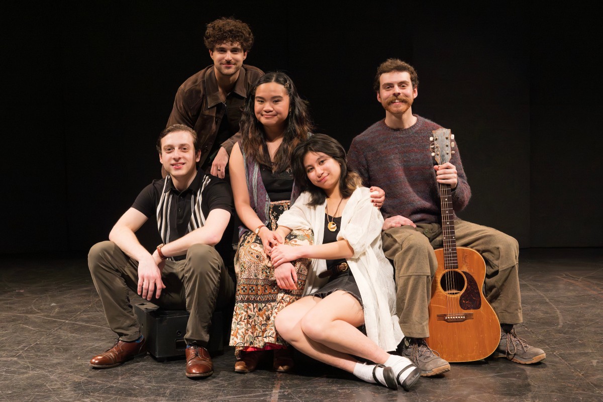 Jamie Papa, a second-year master's student in theatre, with the supporting cast of 
