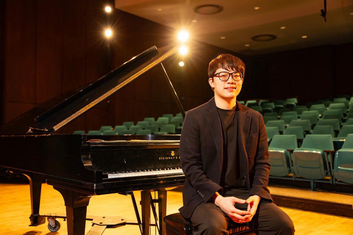 Binghamton University Assistant Professor of Music Theory and Composition Hippocrates Cheng in the Casadesus Recital Hall.