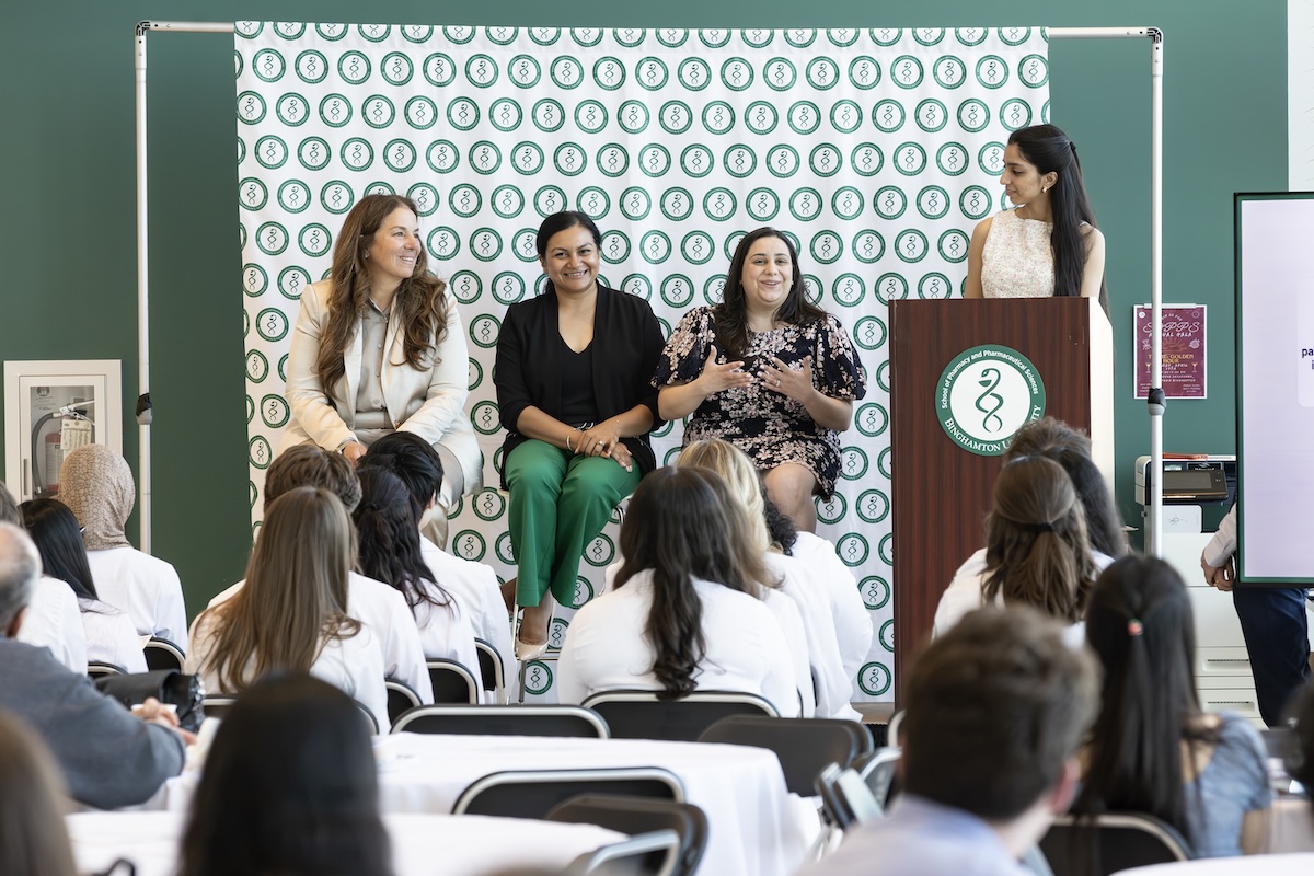 The Phi Lambda Sigma Induction Ceremony was held on Friday, April 17. The keynote panel, introduced by P4 student Heeral Naik (standing at right), featured leaders in the pharmaceutical industry (sitting from left to right): Lucrecia Campisi, Sara Asif Spencer, and Sandi Khalla.