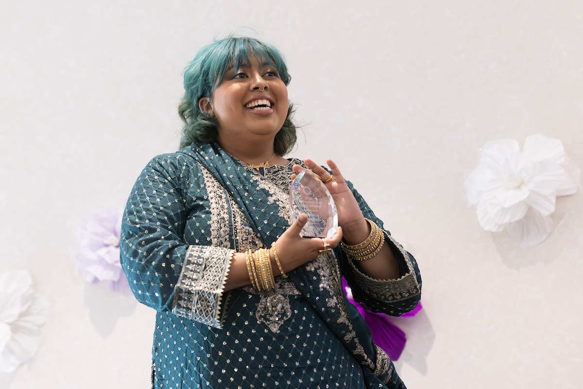 Mansha Rahman received the OUTStanding Award. and delivered the graduate student address.