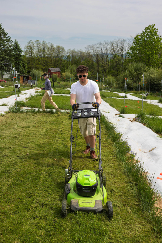 Jenna Allen '26 (left) and undergraduate Adam Lynch (right) work at the PLEDGE research site.