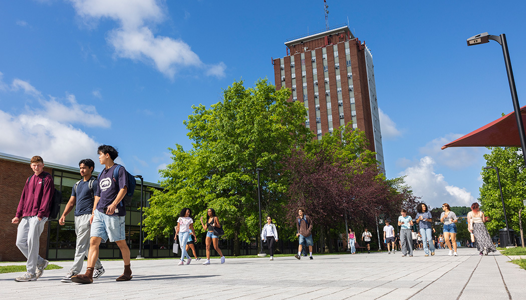 Students walk the spine near the Glenn G. Bartle Library tower Aug. 18, 2026, the first day of classes.
