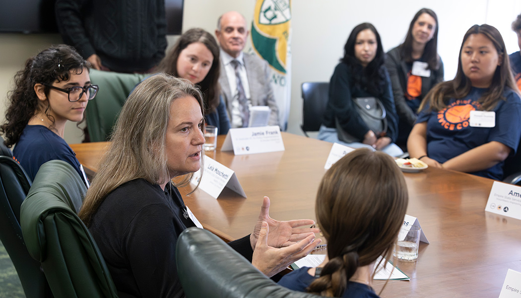 Naorah Rimkunas, associate director of the Binghamton University Couper-Owens Center for Community Schools, discusses the benefits of work performed by students in the Empire State Service Corps during a roundtable on Wednesday, Sept. 9, 2026, with SUNY Chancellor John B. King Jr.