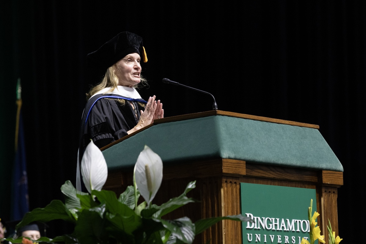 Susan Marenoff-Zausner ‘87, president of the Intrepid Museum, speaks to the Class of 2026.