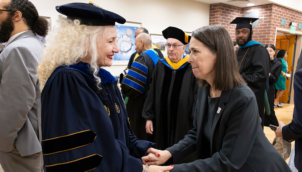 University of Connecticut President Radenka Maric greets Binghamton University President Anne D'Alleva before D'Alleva's formal inauguration ceremony Oct. 2, 2026. Before coming to Binghamton in November 2025, D'Alleva was the provost and executive vice president for academic affairs at the University of Connecticut.
