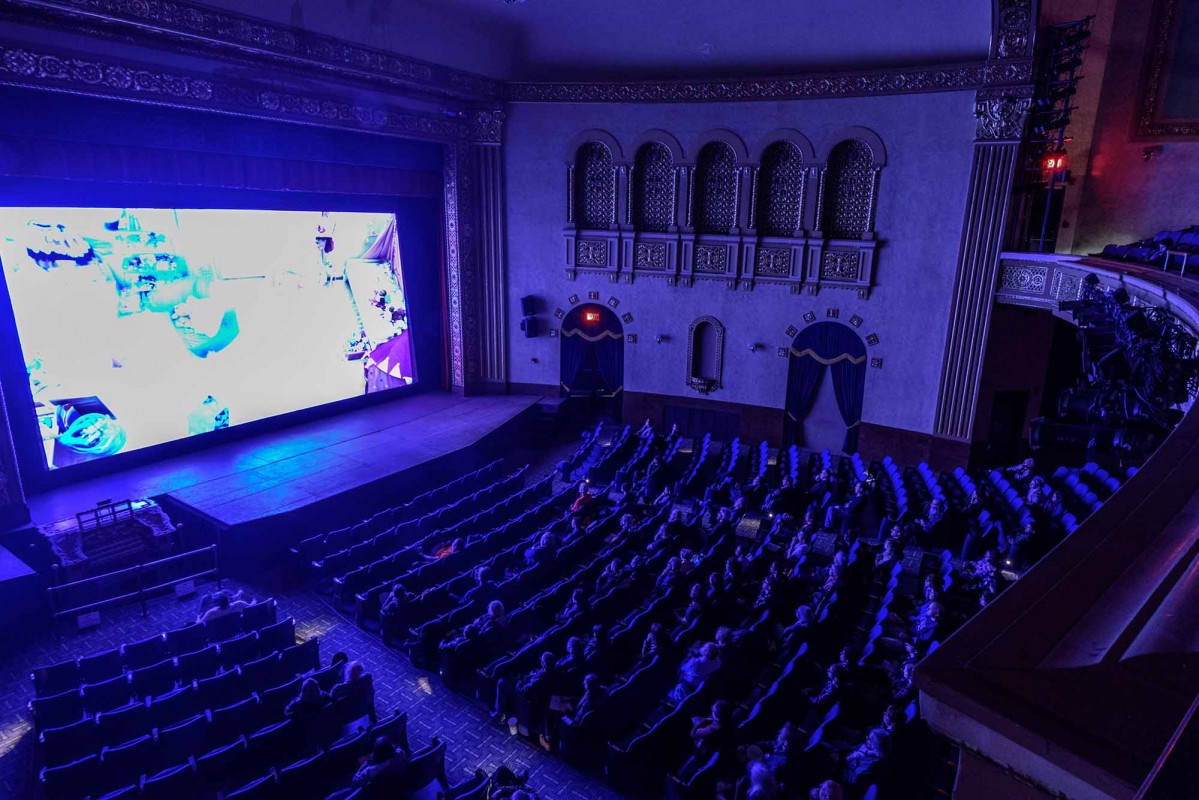 Viewers in a theater watch films at the famous Ann Arbor Film Festival.