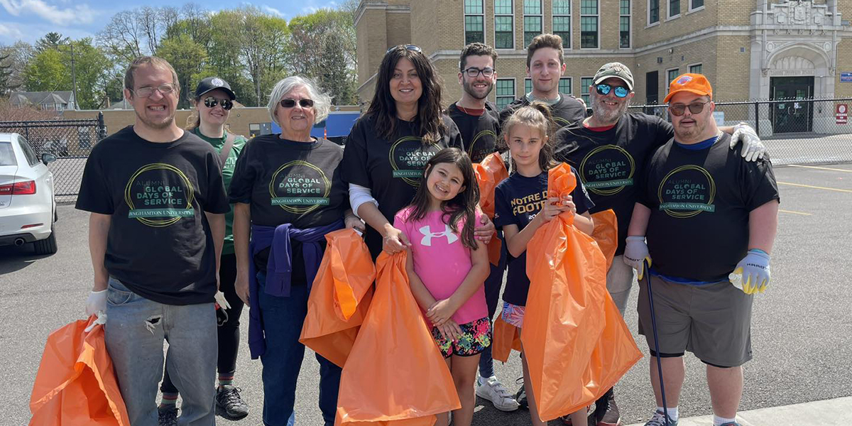 A group of volunteers met at Thomas Jefferson Elementary School in Binghamton for a West Side neighborhood cleanup effort as part of Alumni Global Days of Service.